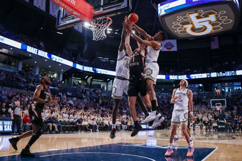 Mar 2, 2024; Atlanta, Georgia, USA; Florida State Seminoles guard Jalen Warley (1) is defended by Georgia Tech Yellow Jackets forward Baye Ndongo (11) and forward Tafara Gapare (5) in the first half at McCamish Pavilion. Mandatory Credit: Brett Davis-USA TODAY Sports