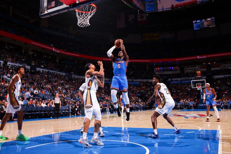 OKLAHOMA CITY, OK - NOVEMBER 13:  Luguentz Dort #5 of the Oklahoma City Thunder shoots the ball during the game against the New Orleans Pelicans on November 13, 2024 at Paycom Center in Oklahoma City, Oklahoma. NOTE TO USER: User expressly acknowledges and agrees that, by downloading and or using this photograph, User is consenting to the terms and conditions of the Getty Images License Agreement. Mandatory Copyright Notice: Copyright 2024 NBAE (Photo by Zach Beeker/NBAE via Getty Images)