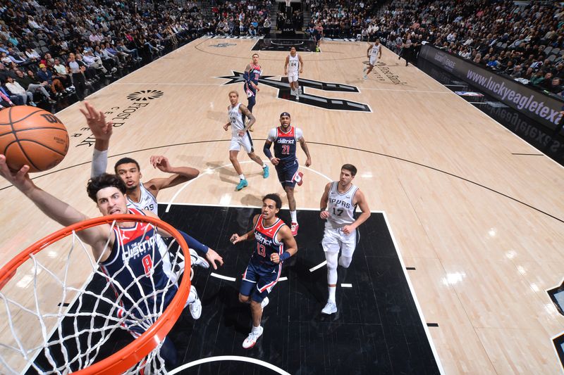SAN ANTONIO, TX - JANUARY 29:  Deni Avdija #8 of the Washington Wizards drives to the basket during the game  against the San Antonio Spurs on January 29, 2024 at the Frost Bank Center in San Antonio, Texas. NOTE TO USER: User expressly acknowledges and agrees that, by downloading and or using this photograph, user is consenting to the terms and conditions of the Getty Images License Agreement. Mandatory Copyright Notice: Copyright 2024 NBAE (Photos by Michael Gonzales/NBAE via Getty Images)