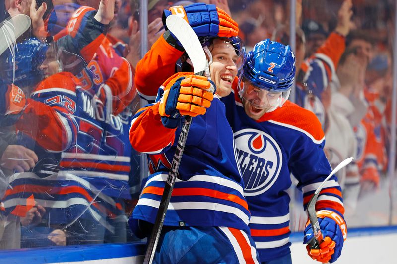 Apr 10, 2024; Edmonton, Alberta, CAN; The Edmonton Oilers celebrate a goal scored by forward Dylan Holloway (55) during the third period against the Vegas Golden Knights at Rogers Place. Mandatory Credit: Perry Nelson-USA TODAY Sports