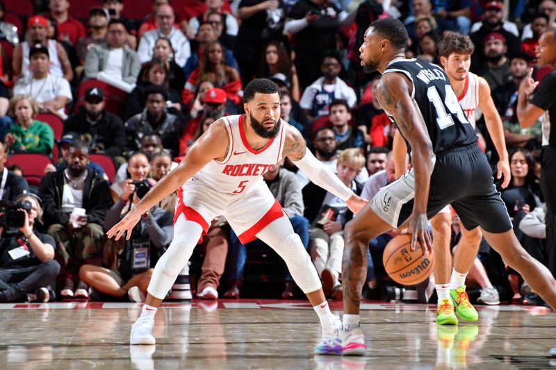 HOUSTON, TX - OCTOBER 17: Fred VanVleet #5 of the Houston Rockets plays defense during the game against the San Antonio Spurs on October 17, 2024 at the Toyota Center in Houston, Texas. NOTE TO USER: User expressly acknowledges and agrees that, by downloading and or using this photograph, User is consenting to the terms and conditions of the Getty Images License Agreement. Mandatory Copyright Notice: Copyright 2024 NBAE (Photo by Logan Riely/NBAE via Getty Images)