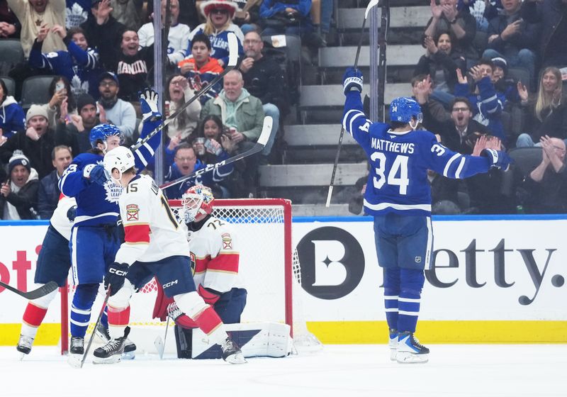 Jan 6, 2026; Toronto, Ontario, CAN; Toronto Maple Leafs center Auston Matthews (34) celebrates scoring a goal against the Florida Panthers during the second period at Scotiabank Arena. Mandatory Credit: Nick Turchiaro-Imagn Images