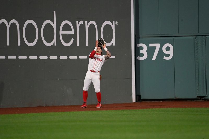 May 16, 2024; Boston, Massachusetts, USA;  Boston Red Sox center fielder Jarren Duran (16) makes a catch for an out against the Tampa Bay Rays  during the fifth inning at Fenway Park. Mandatory Credit: Eric Canha-USA TODAY Sports