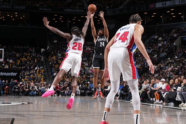 BROOKLYN, NY - DECEMBER 23: Cam Thomas #24 of the Brooklyn Nets shoots a three point basket against the Detroit Pistons on December 23, 2023 at Barclays Center in Brooklyn, New York. NOTE TO USER: User expressly acknowledges and agrees that, by downloading and or using this Photograph, user is consenting to the terms and conditions of the Getty Images License Agreement. Mandatory Copyright Notice: Copyright 2023 NBAE (Photo by Jesse D. Garrabrant/NBAE via Getty Images)