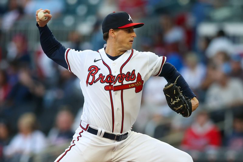 Apr 11, 2023; Atlanta, Georgia, USA; Atlanta Braves starting pitcher Kyle Wright (30) throws against the Cincinnati Reds in the first inning at Truist Park. Mandatory Credit: Brett Davis-USA TODAY Sports
