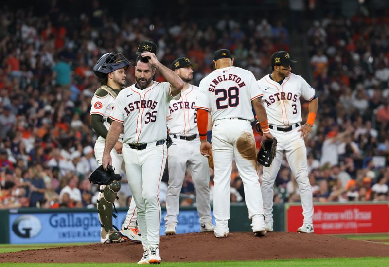May 18, 2024; Houston, Texas, USA; Houston Astros starting pitcher Justin Verlander (35) is taken out of the game against the Milwaukee Brewers in the fifth inning at Minute Maid Park. Mandatory Credit: Thomas Shea-USA TODAY Sports