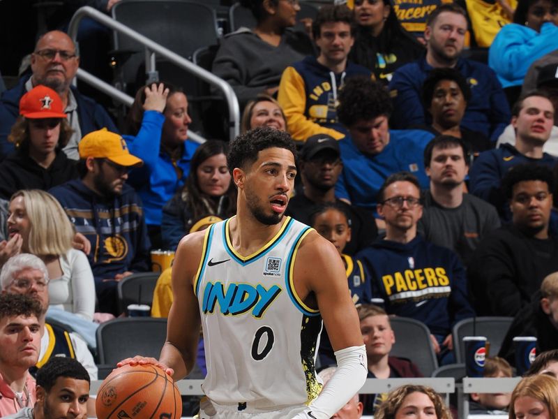 INDIANAPOLIS, IN - NOVEMBER 27: Tyrese Haliburton #0 of the Indiana Pacers dribbles the ball during the game against the Portland Trail Blazers on November 27, 2024 at Gainbridge Fieldhouse in Indianapolis, Indiana. NOTE TO USER: User expressly acknowledges and agrees that, by downloading and or using this Photograph, user is consenting to the terms and conditions of the Getty Images License Agreement. Mandatory Copyright Notice: Copyright 2024 NBAE (Photo by Ron Hoskins/NBAE via Getty Images)