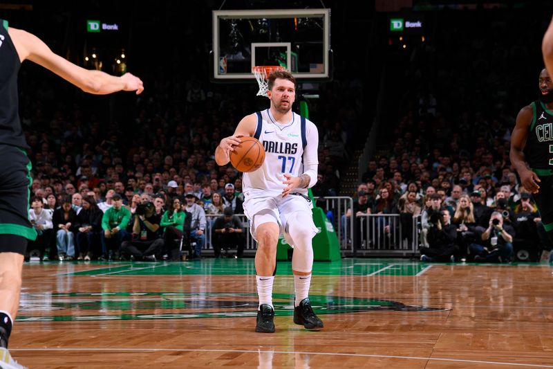 BOSTON, MA - MARCH 1: Luka Doncic #77 of the Dallas Mavericks dribbles the ball during the game against the Boston Celtics on March 1, 2024 at the TD Garden in Boston, Massachusetts. NOTE TO USER: User expressly acknowledges and agrees that, by downloading and or using this photograph, User is consenting to the terms and conditions of the Getty Images License Agreement. Mandatory Copyright Notice: Copyright 2024 NBAE  (Photo by Brian Babineau/NBAE via Getty Images)