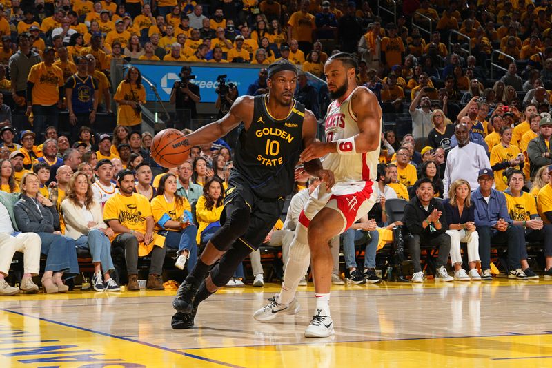 SAN FRANCISCO, CA - MAY 2: Jimmy Butler #10 of the Golden State Warriors dribbles the ball during the game against the Houston Rockets during Round 1 Game 6 of the 2025 NBA Playoffs on May 2, 2025 at Chase Center in San Francisco, California. NOTE TO USER: User expressly acknowledges and agrees that, by downloading and or using this photograph, user is consenting to the terms and conditions of Getty Images License Agreement. Mandatory Copyright Notice: Copyright 2025 NBAE (Photo by Jesse D. Garrabrant/NBAE via Getty Images)