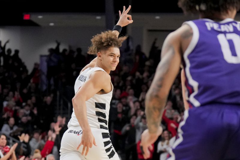 Jan 16, 2024; Cincinnati, Ohio, USA;  Cincinnati Bearcats guard Dan Skillings Jr. (0) reacts to making a three-point basket against the TCU Horned Frogs in the first half at Fifth Third Arena. Mandatory Credit: Aaron Doster-USA TODAY Sports