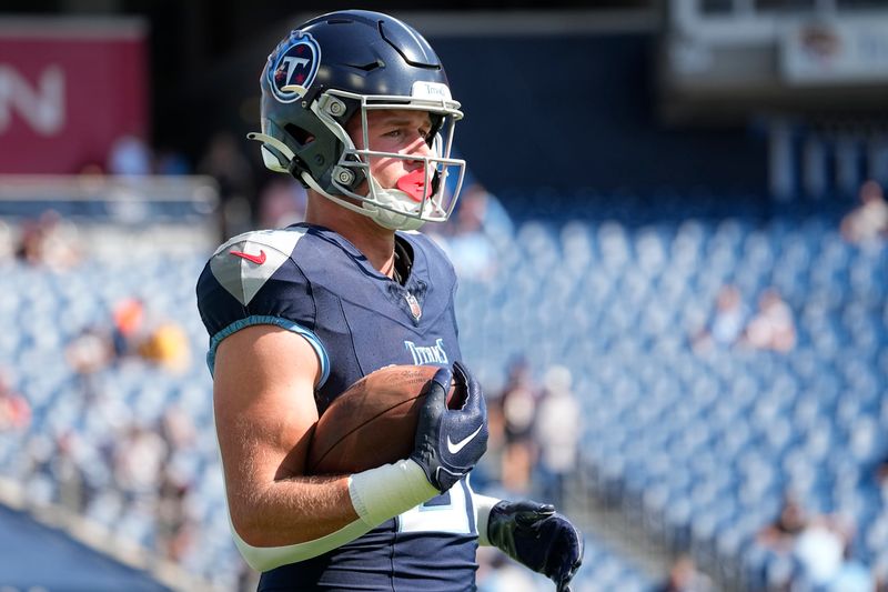 Tennessee Titans tight end Josh Whyle warms up before an NFL football game against the Cincinnati Bengals, Sunday, Oct. 1, 2023, in Nashville, Tenn. (AP Photo/George Walker IV)