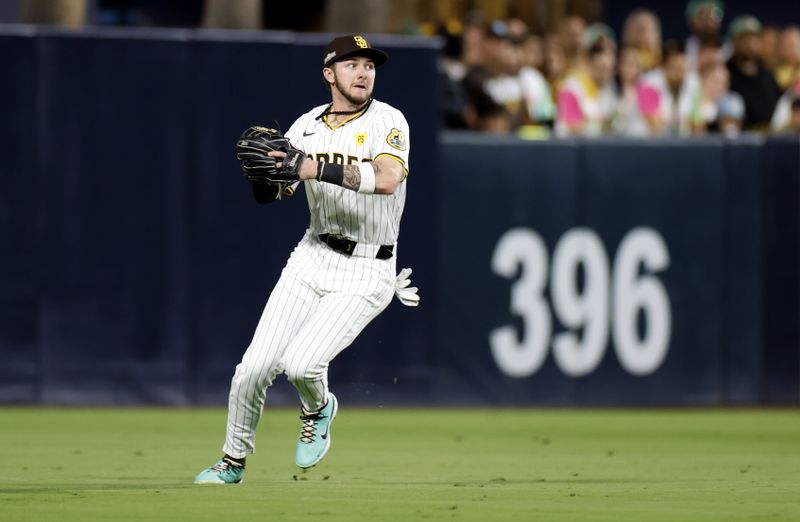 Oct 9, 2024; San Diego, California, USA; San Diego Padres outfielder Jackson Merrill (3) throws to the infield in the second inning against the Los Angeles Dodgers during game four of the NLDS for the 2024 MLB Playoffs at Petco Park. Mandatory Credit: David Frerker-Imagn Images
