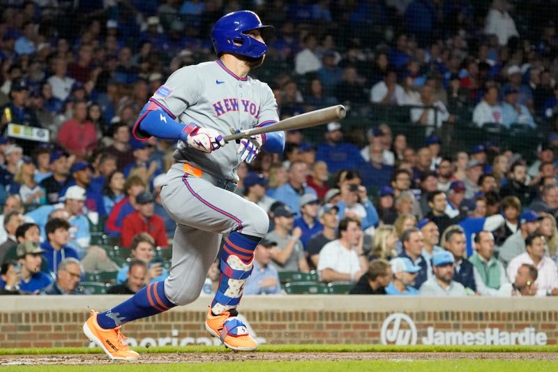 Sep 25, 2025; Chicago, Illinois, USA; New York Mets outfielder Brandon Nimmo (9) hits a one run single against the Chicago Cubs during the first inning at Wrigley Field. Mandatory Credit: David Banks-Imagn Images