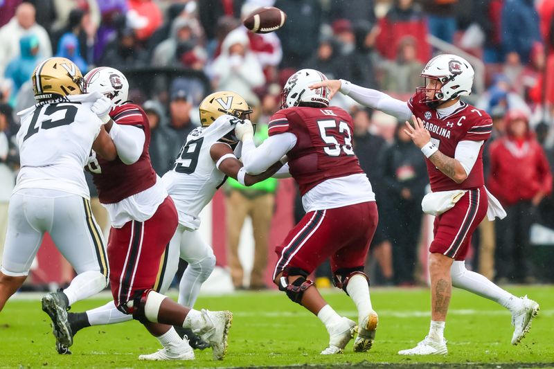 Nov 11, 2023; Columbia, South Carolina, USA; South Carolina Gamecocks quarterback Spencer Rattler (7) throws a pass against the Vanderbilt Commodores in the second quarter at Williams-Brice Stadium. Mandatory Credit: Jeff Blake-USA TODAY Sports