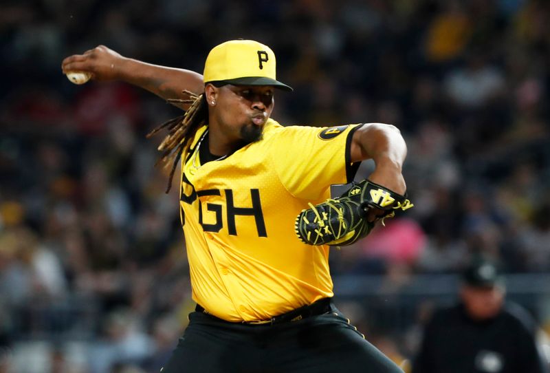 May 24, 2024; Pittsburgh, Pennsylvania, USA;  Pittsburgh Pirates relief pitcher Luis L. Ortiz (48) pitches against the Atlanta Braves during the ninth inning at PNC Park. The Pirates won 11-5. Mandatory Credit: Charles LeClaire-USA TODAY Sports