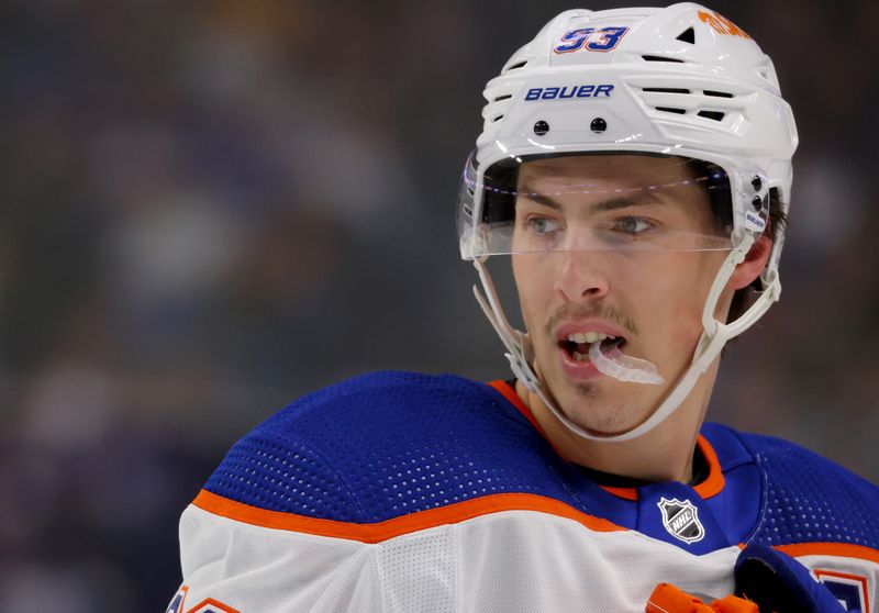 Mar 9, 2024; Buffalo, New York, USA;  Edmonton Oilers center Ryan Nugent-Hopkins (93) during a stoppage in play against the Buffalo Sabres during the first period at KeyBank Center. Mandatory Credit: Timothy T. Ludwig-USA TODAY Sports