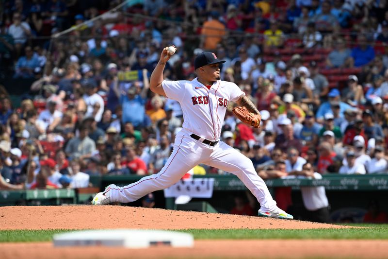 Aug 6, 2023; Boston, Massachusetts, USA; Boston Red Sox bullpen catcher Mani Martinez (88) pitches against the Toronto Blue Jays during the fifth inning at Fenway Park. Mandatory Credit: Eric Canha-USA TODAY Sports