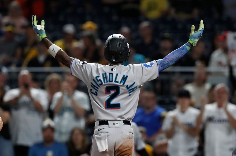 Sep 30, 2023; Pittsburgh, Pennsylvania, USA; Miami Marlins center fielder Jazz Chisholm Jr. (2) reacts to the Miami fans in attendance as he crosses home plate on a solo home run against the Pittsburgh Pirates during the third inning at PNC Park. Mandatory Credit: Charles LeClaire-USA TODAY Sports