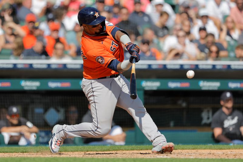 Aug 27, 2023; Detroit, Michigan, USA;  Houston Astros catcher Martin Maldonado (15) hits a home run in the seventh inning against the Detroit Tigers at Comerica Park. Mandatory Credit: Rick Osentoski-USA TODAY Sports