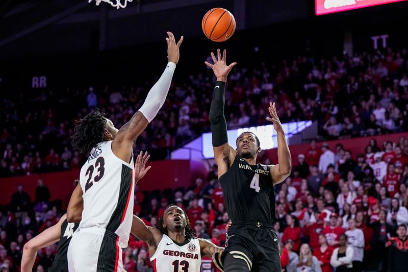 Jan 21, 2023; Athens, Georgia, USA; Vanderbilt Commodores guard Jordan Wright (4) shoots over Georgia Bulldogs center Braelen Bridges (23) during the first half at Stegeman Coliseum. Mandatory Credit: Dale Zanine-USA TODAY Sports