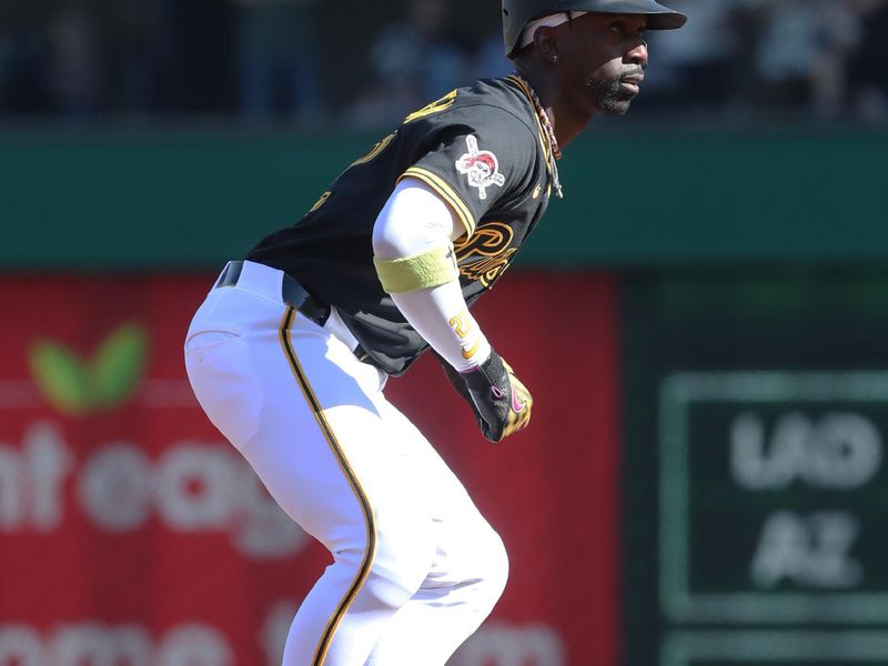 May 10, 2025; Pittsburgh, Pennsylvania, USA;  Pittsburgh Pirates designated hitter Andrew McCutchen (22) takes a lead off of second base against the Atlanta Braves during the third inning at PNC Park. Mandatory Credit: Charles LeClaire-Imagn Images