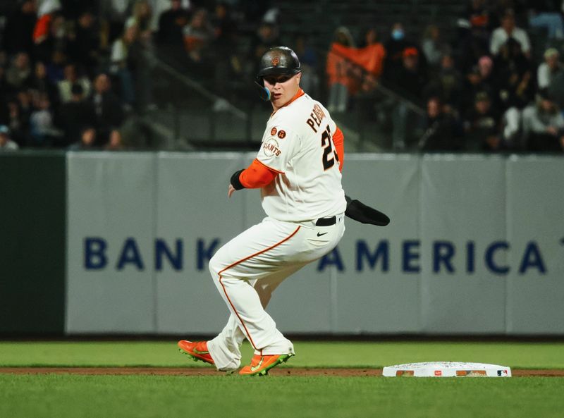 Aug 28, 2023; San Francisco, California, USA; San Francisco Giants pinch hitter Joc Pederson (23) looks over his shoulder as he reaches second base against the Cincinnati Reds during the sixth inning at Oracle Park. Mandatory Credit: Kelley L Cox-USA TODAY Sports