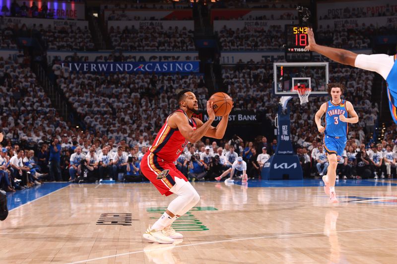 OKLAHOMA CITY, OK - APRIL 24: CJ McCollum #3 of the New Orleans Pelicans shoots the ball during the game against the Oklahoma City Thunder during Round 1 Game 2 of the 2024 NBA Playoffs on April 24, 2024 at Paycom Arena in Oklahoma City, Oklahoma. NOTE TO USER: User expressly acknowledges and agrees that, by downloading and or using this photograph, User is consenting to the terms and conditions of the Getty Images License Agreement. Mandatory Copyright Notice: Copyright 2024 NBAE (Photo by Zach Beeker/NBAE via Getty Images)