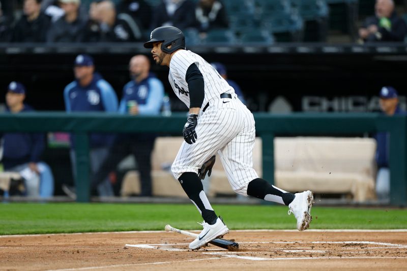 Apr 26, 2024; Chicago, Illinois, USA; Chicago White Sox left fielder Tommy Pham (28) singles against the Tampa Bay Rays during the first inning at Guaranteed Rate Field. Mandatory Credit: Kamil Krzaczynski-USA TODAY Sports