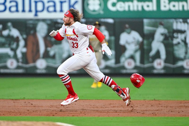 Aug 26, 2024; St. Louis, Missouri, USA;  St. Louis Cardinals second baseman Brendan Donovan (33) runs to third for a triple during the second inning against the San Diego Padres at Busch Stadium. Mandatory Credit: Jeff Curry-USA TODAY Sports