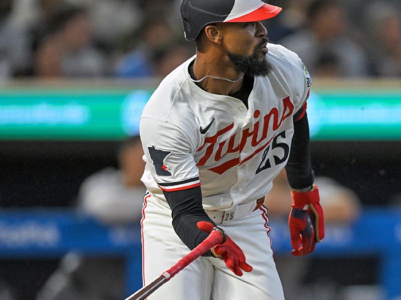 Sep 17, 2025; Minneapolis, Minnesota, USA;  Minnesota Twins outfielder Byron Buxton (25) hits a double against the New York Yankees during the third inning at Target Field. Mandatory Credit: Nick Wosika-Imagn Images