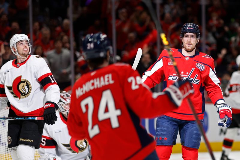 Mar 3, 2025; Washington, District of Columbia, USA; Washington Capitals left wing Pierre-Luc Dubois (80) celebrates after scoring a goal with Capitals center Connor McMichael (24) against the Ottawa Senators first period at Capital One Arena. Mandatory Credit: Geoff Burke-Imagn Images