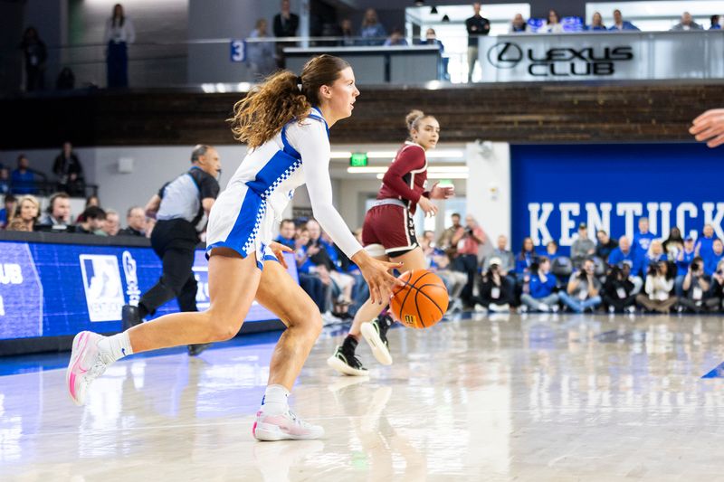 Mar 1, 2026; Lexington, Kentucky, USA; Kentucky Wildcats forward Amelia Hassett (32) dribbles down the court after getting a rebound during the second quarter at Memorial Coliseum. Mandatory Credit: Arden Barnes-Imagn Images