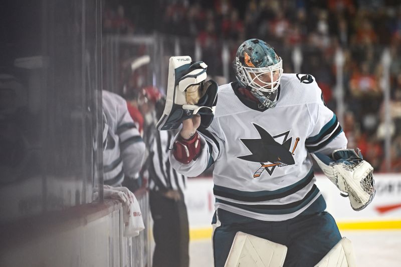 Feb 15, 2024; Calgary, Alberta, CAN; San Jose Sharks goaltender Mackenzie Blackwood (29) heads back to his net after a stoppage in play during the third period of a game against the Calgary Flames at Scotiabank Saddledome. Mandatory Credit: Brett Holmes-USA TODAY Sports