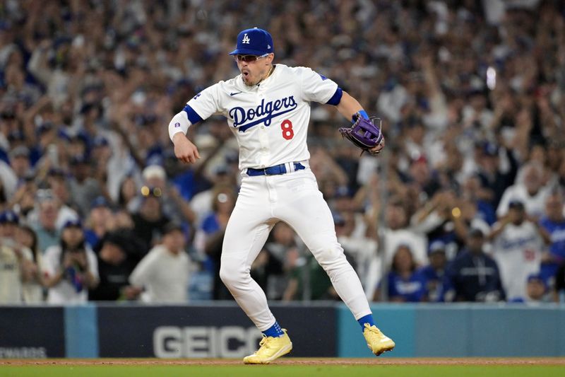 Oct 11, 2024; Los Angeles, California, USA; Los Angeles Dodgers third baseman Enrique Hernandez (8) celebrates after defeating the San Diego Padres during game five of the NLDS for the 2024 MLB Playoffs at Dodger Stadium. Mandatory Credit: Jayne Kamin-Oncea-Imagn Images