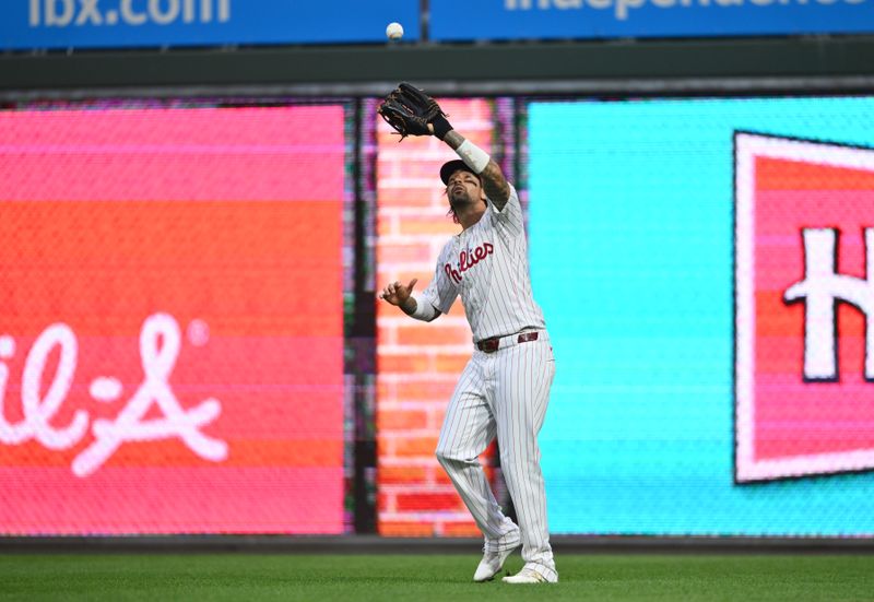 Aug 17, 2024; Philadelphia, Pennsylvania, USA; Philadelphia Phillies outfielder Nick Castellanos (8) fields a fly ball against the Washington Nationals in the first inning at Citizens Bank Park. Mandatory Credit: Kyle Ross-USA TODAY Sports