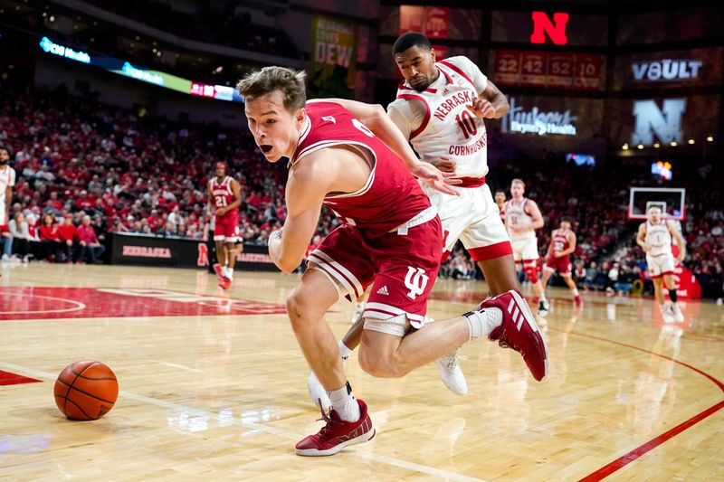 Jan 3, 2024; Lincoln, Nebraska, USA; Indiana Hoosiers guard Gabe Cupps (2) scrambles for the ball against the Nebraska Cornhuskers during the second half at Pinnacle Bank Arena. Mandatory Credit: Dylan Widger-USA TODAY Sports