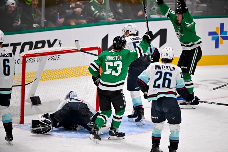 Nov 9, 2025; Dallas, Texas, USA; Dallas Stars center Wyatt Johnston (53) celebrates after he scores a power play goal against Seattle Kraken goaltender Matt Murray (30) during the first period at the American Airlines Center. Mandatory Credit: Jerome Miron-Imagn Images