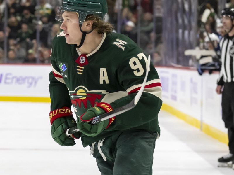 Nov 25, 2024; Saint Paul, Minnesota, USA;  Minnesota Wild forward Kirill Kaprizov (97) turns up-ice against the Winnipeg Jets during the third period at Xcel Energy Center. Mandatory Credit: Nick Wosika-Imagn Images