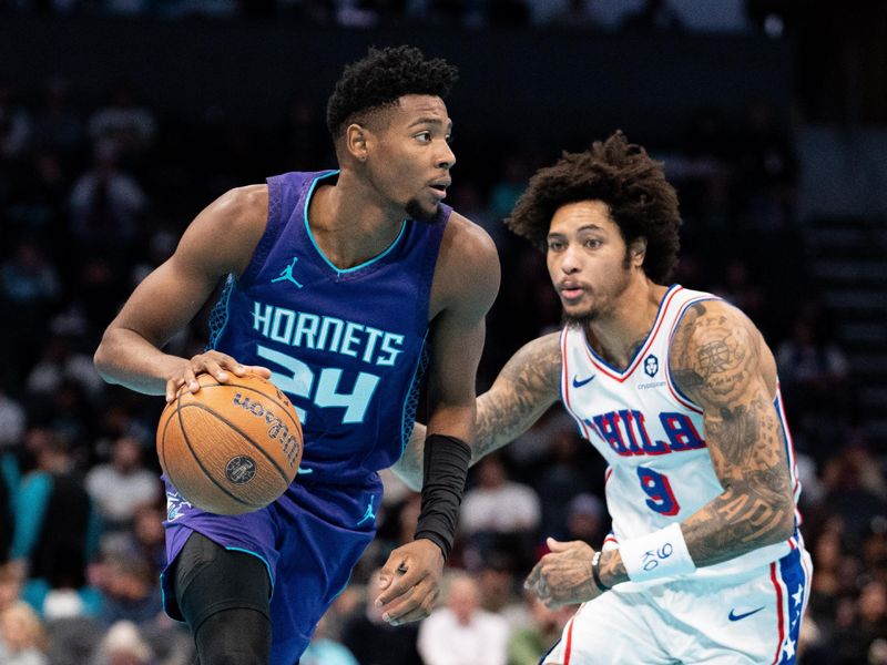 CHARLOTTE, NORTH CAROLINA - DECEMBER 03: Kelly Oubre Jr. #9 of the Philadelphia 76ers guards Brandon Miller #24 of the Charlotte Hornets in the first quarter of the game during the Emirates NBA Cup at Spectrum Center on December 03, 2024 in Charlotte, North Carolina. NOTE TO USER: User expressly acknowledges and agrees that, by downloading and or using this photograph, User is consenting to the terms and conditions of the Getty Images License Agreement. (Photo by Jacob Kupferman/Getty Images)