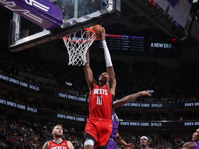 SALT LAKE CITY, UT - MARCH 29: Jabari Smith Jr. #10 of the Houston Rockets dunks the ball during the game against the Utah Jazz on March 29, 2024 at Delta Center in Salt Lake City, Utah. NOTE TO USER: User expressly acknowledges and agrees that, by downloading and or using this Photograph, User is consenting to the terms and conditions of the Getty Images License Agreement. Mandatory Copyright Notice: Copyright 2024 NBAE (Photo by Melissa Majchrzak/NBAE via Getty Images)