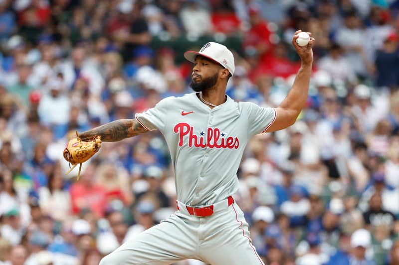 Jul 4, 2024; Chicago, Illinois, USA; Philadelphia Phillies starting pitcher Cristopher Sánchez (61) delivers a pitch against the Chicago Cubs during the first inning at Wrigley Field. Mandatory Credit: Kamil Krzaczynski-USA TODAY Sports