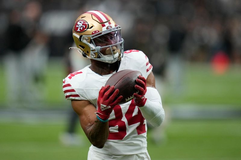 San Francisco 49ers wide receiver Dazz Newsome (84) warms up before an NFL football game against the Las Vegas Raiders, Sunday, Aug. 13, 2023, in Las Vegas. (AP Photo/John Locher)