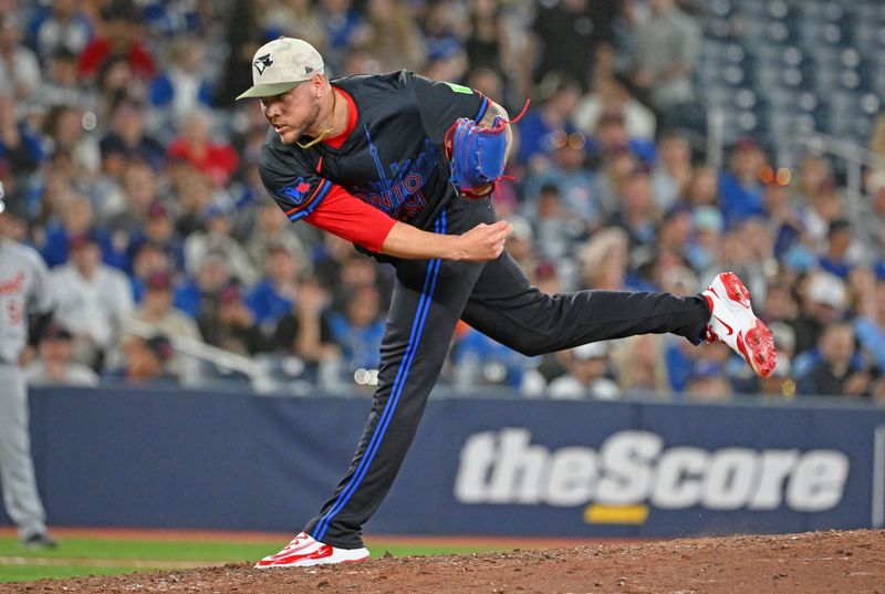 May 16, 2025; Toronto, Ontario, CAN;  Toronto Blue Jays relief pitcher Yariel Rodriguez (29) delivers a pitch against the Detroit Tigers in the ninth inning at Rogers Centre. Mandatory Credit: Dan Hamilton-Imagn Images