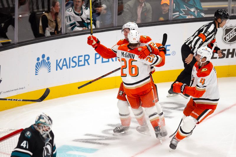 Oct 12, 2024; San Jose, California, USA; Anaheim Ducks left winger Brock McGinn (26) and center Isac Lundestrom (21) celebrate after a goal by Lundestrom against the San Jose Sharks during the third period at SAP Center at San Jose. Mandatory Credit: D. Ross Cameron-Imagn Images