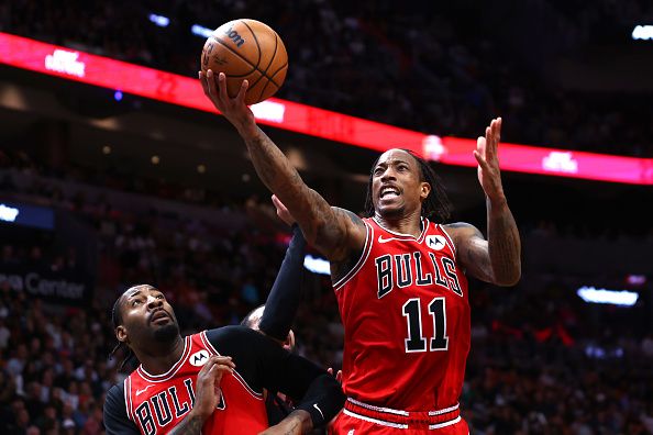 MIAMI, FLORIDA - DECEMBER 16: DeMar DeRozan #11 of the Chicago Bulls drives to the basket against the Miami Heat during the third quarter of the game at Kaseya Center on December 16, 2023 in Miami, Florida. NOTE TO USER: User expressly acknowledges and agrees that, by downloading and or using this photograph, User is consenting to the terms and conditions of the Getty Images License Agreement. (Photo by Megan Briggs/Getty Images)