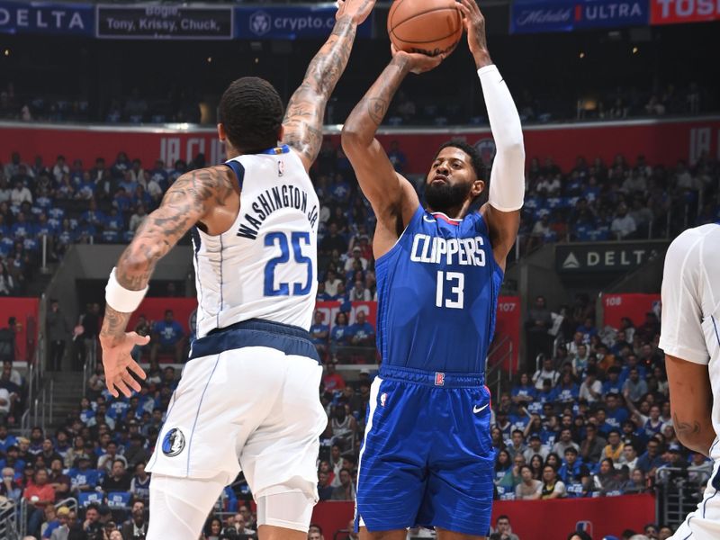 LOS ANGELES, CA - APRIL 21: Paul George #13 of the LA Clippers shoots the ball during the game against the Dallas Mavericks during the 2024 NBA Playoffs on April 21, 2024 at Crypto.Com Arena in Los Angeles, California. NOTE TO USER: User expressly acknowledges and agrees that, by downloading and/or using this Photograph, user is consenting to the terms and conditions of the Getty Images License Agreement. Mandatory Copyright Notice: Copyright 2024 NBAE (Photo by Andrew D. Bernstein/NBAE via Getty Images)