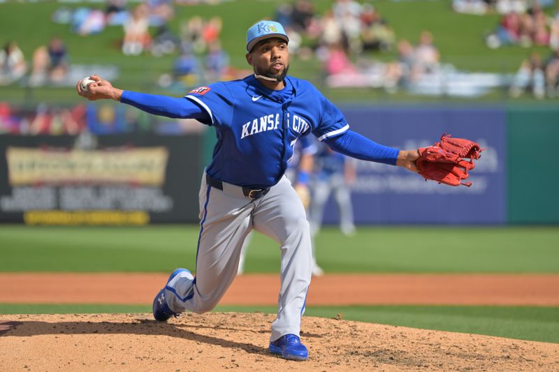 Feb 20, 2026; Surprise, Arizona, USA;  Kansas City Royals pitcher Jose Cuas (74) delivers to the plate in the fourth inning against the Texas Rangers at Surprise Stadium. Mandatory Credit: Jayne Kamin-Oncea-Imagn Images