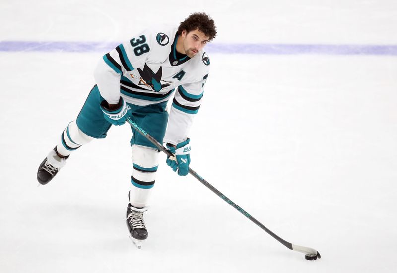 Nov 16, 2024; Pittsburgh, Pennsylvania, USA;  San Jose Sharks defenseman Mario Ferraro (38) warms up against the Pittsburgh Penguins at PPG Paints Arena. Mandatory Credit: Charles LeClaire-Imagn Images