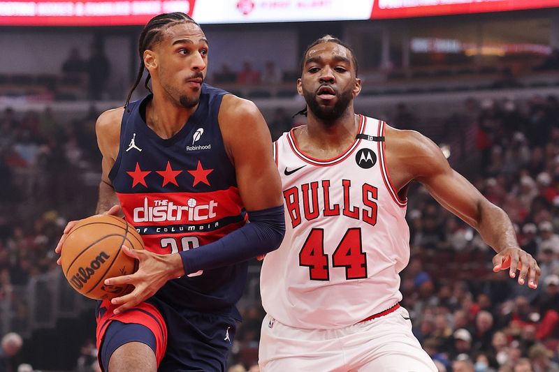 CHICAGO, ILLINOIS - JANUARY 10: Alexandre Sarr #20 of the Washington Wizards drives to the basket against Patrick Williams #44 of the Chicago Bulls during the first half at the United Center on January 10, 2025 in Chicago, Illinois. NOTE TO USER: User expressly acknowledges and agrees that, by downloading and or using this photograph, User is consenting to the terms and conditions of the Getty Images License Agreement.  (Photo by Michael Reaves/Getty Images)