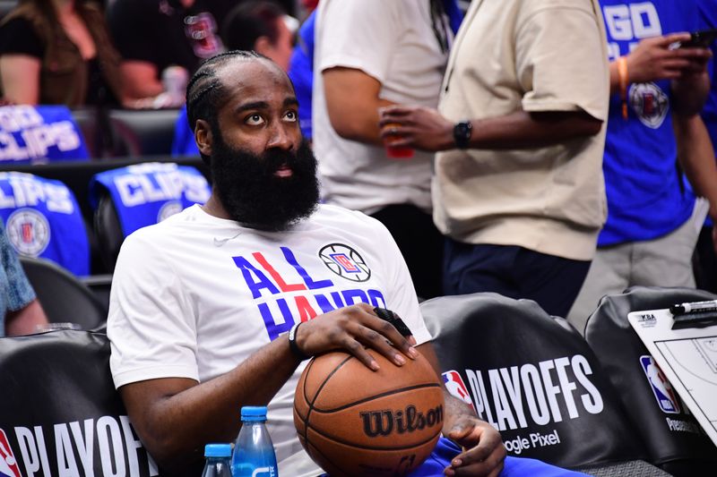 LOS ANGELES, CA - APRIL 21:  James Harden #1 of the LA Clippers looks on before the game against the Dallas Mavericks during Round 1 Game 1 of the 2024 NBA Playoffs on April 21, 2024 at Crypto.Com Arena in Los Angeles, California. NOTE TO USER: User expressly acknowledges and agrees that, by downloading and/or using this Photograph, user is consenting to the terms and conditions of the Getty Images License Agreement. Mandatory Copyright Notice: Copyright 2024 NBAE (Photo by Adam Pantozzi/NBAE via Getty Images)